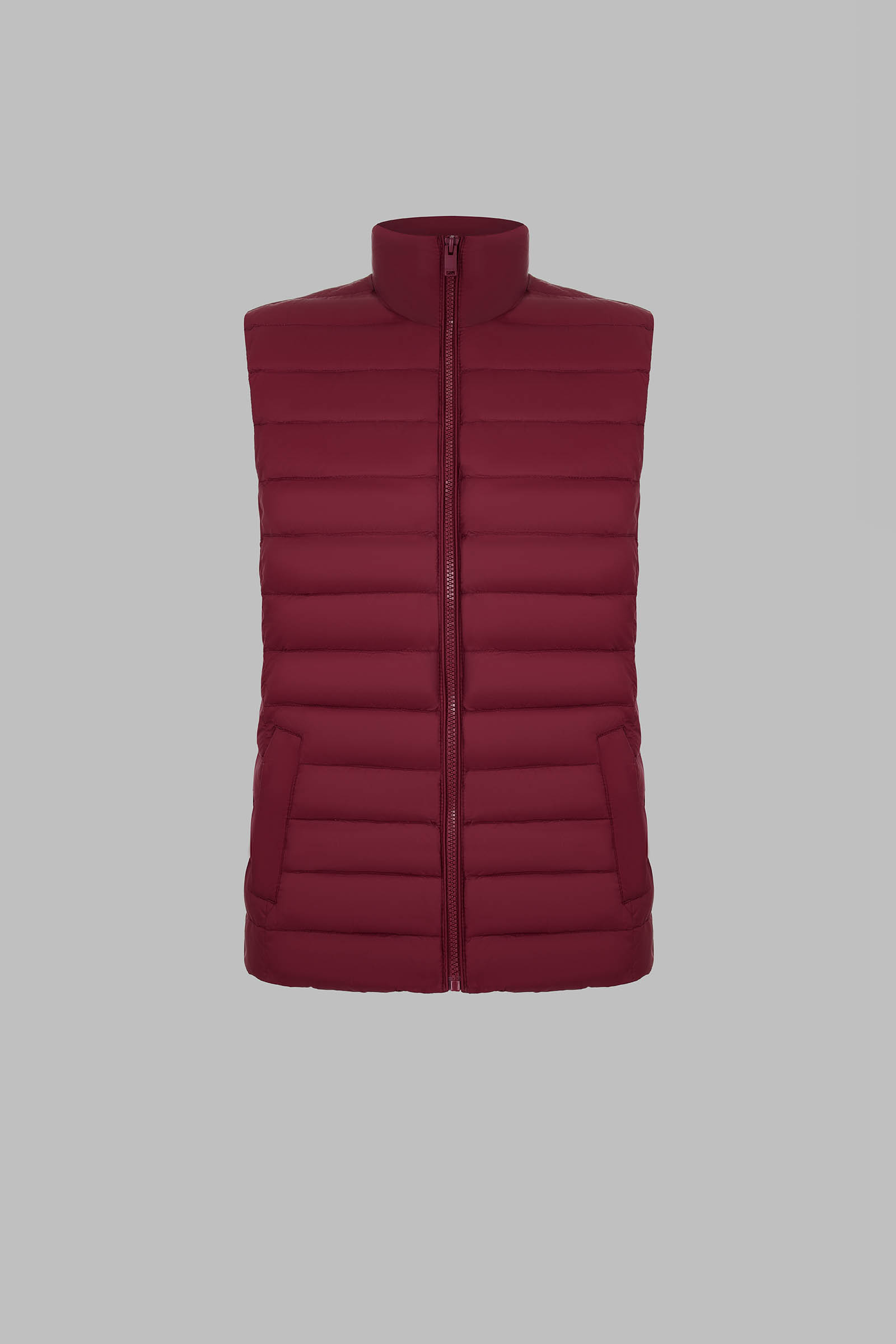 Стеганый пуховый жилет